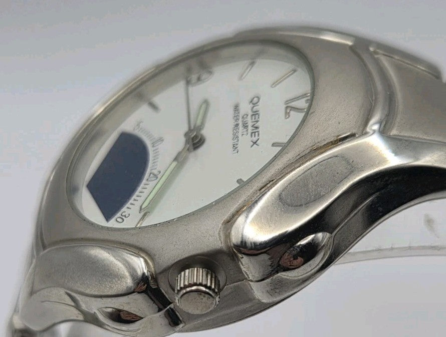 Mens Quemex quartz wristwatch with a silver-tone stainless steel case and...7