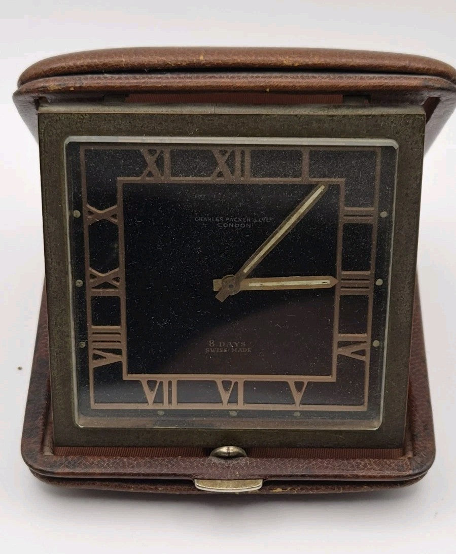 Art Deco 8 day travel clock retailed by Charles Packer London0