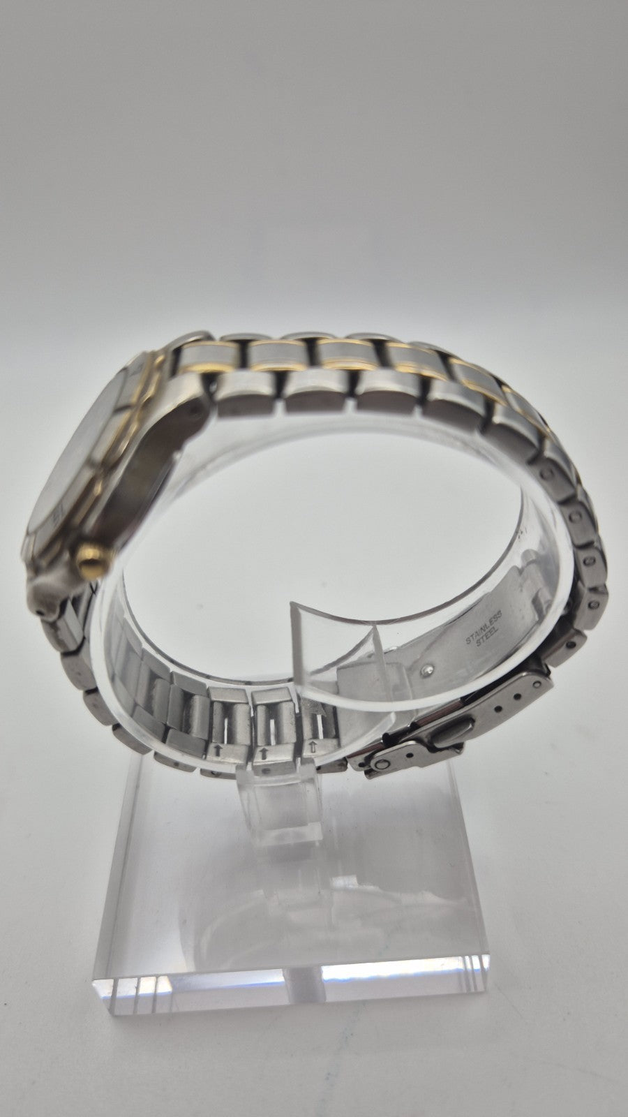 Accurist watch with a blue dial and two-tone bracelet.9