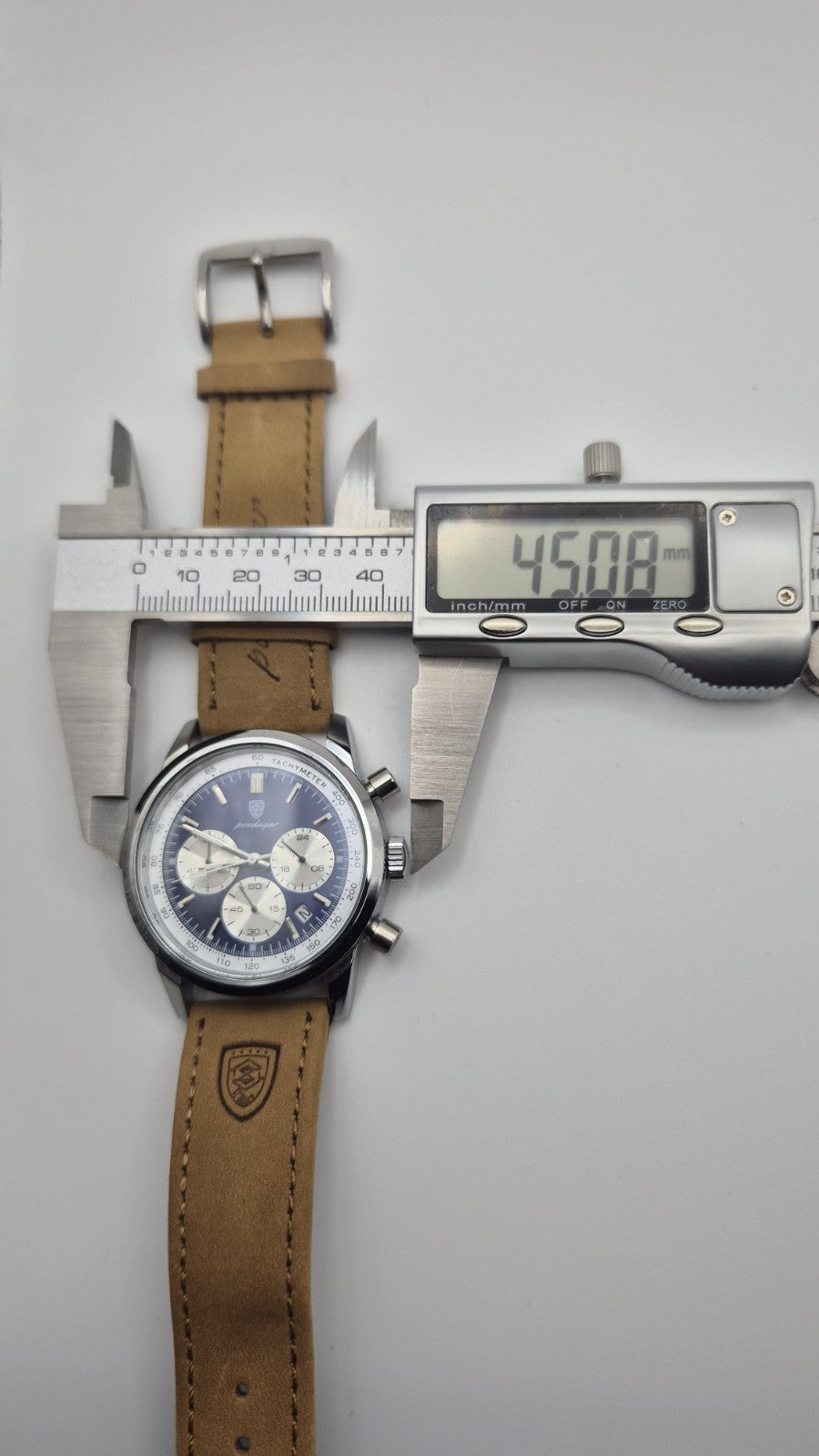 Poedagar men's luxury quartz chronograph watch with a blue dial and a tan...12