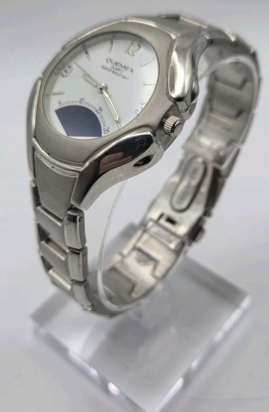 Mens Quemex quartz wristwatch with a silver-tone stainless steel case and...8