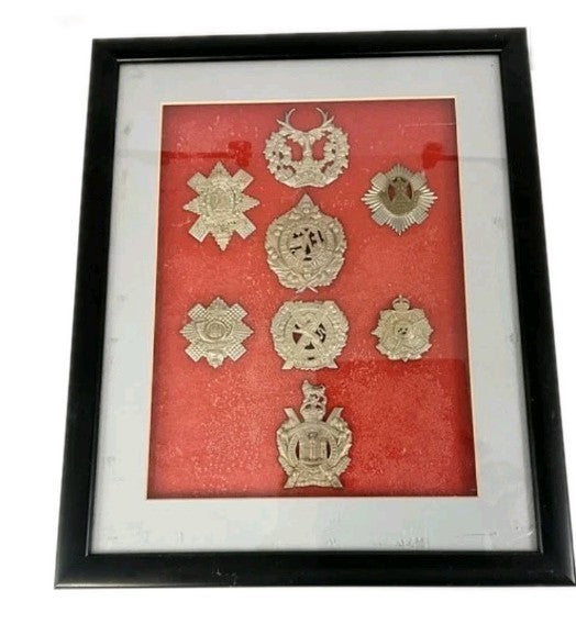 MILITARY METAL CAP BADGES  MOUNTED AND FRAMED0