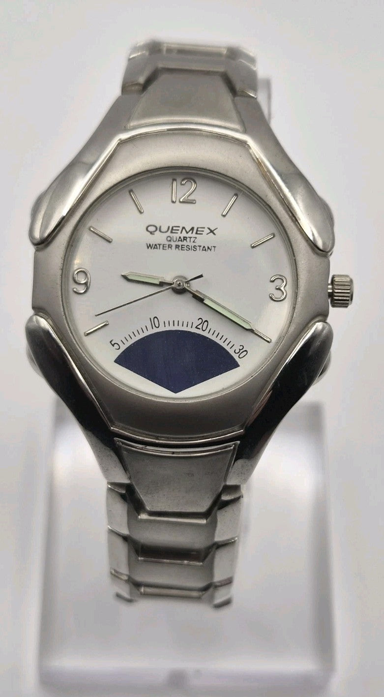 Mens Quemex quartz wristwatch with a silver-tone stainless steel case and...1