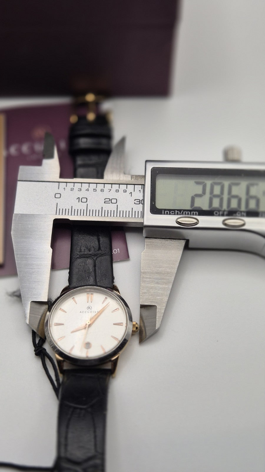 Accurist Ladies Classic Date wristwatch model 8073 with a white dial and...18