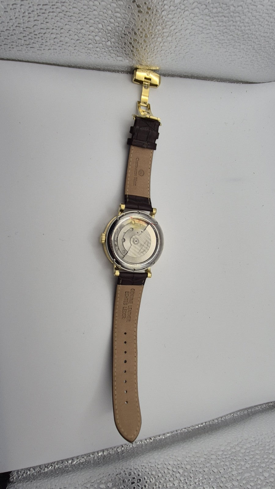 CONSTANTIN WEISZ LIMITED EDITION WRIST WATCH FEATURING A A GOLD PLATED CASE WITH12
