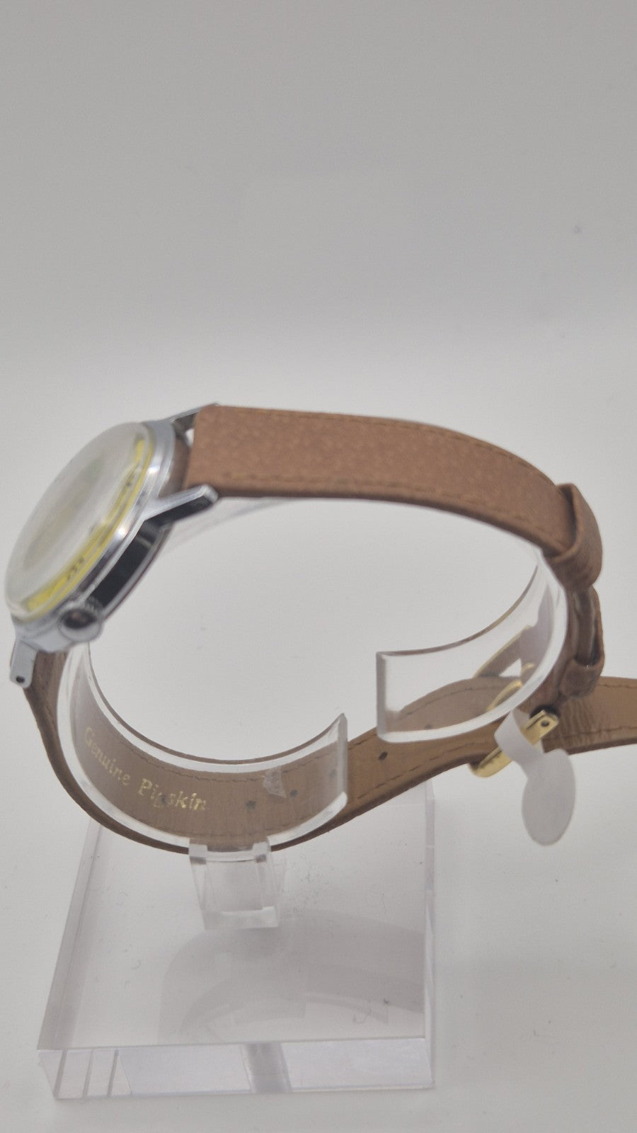 Vintage Timex Snoopy "Tennis" watch features a yellow dial with a mechanical...7