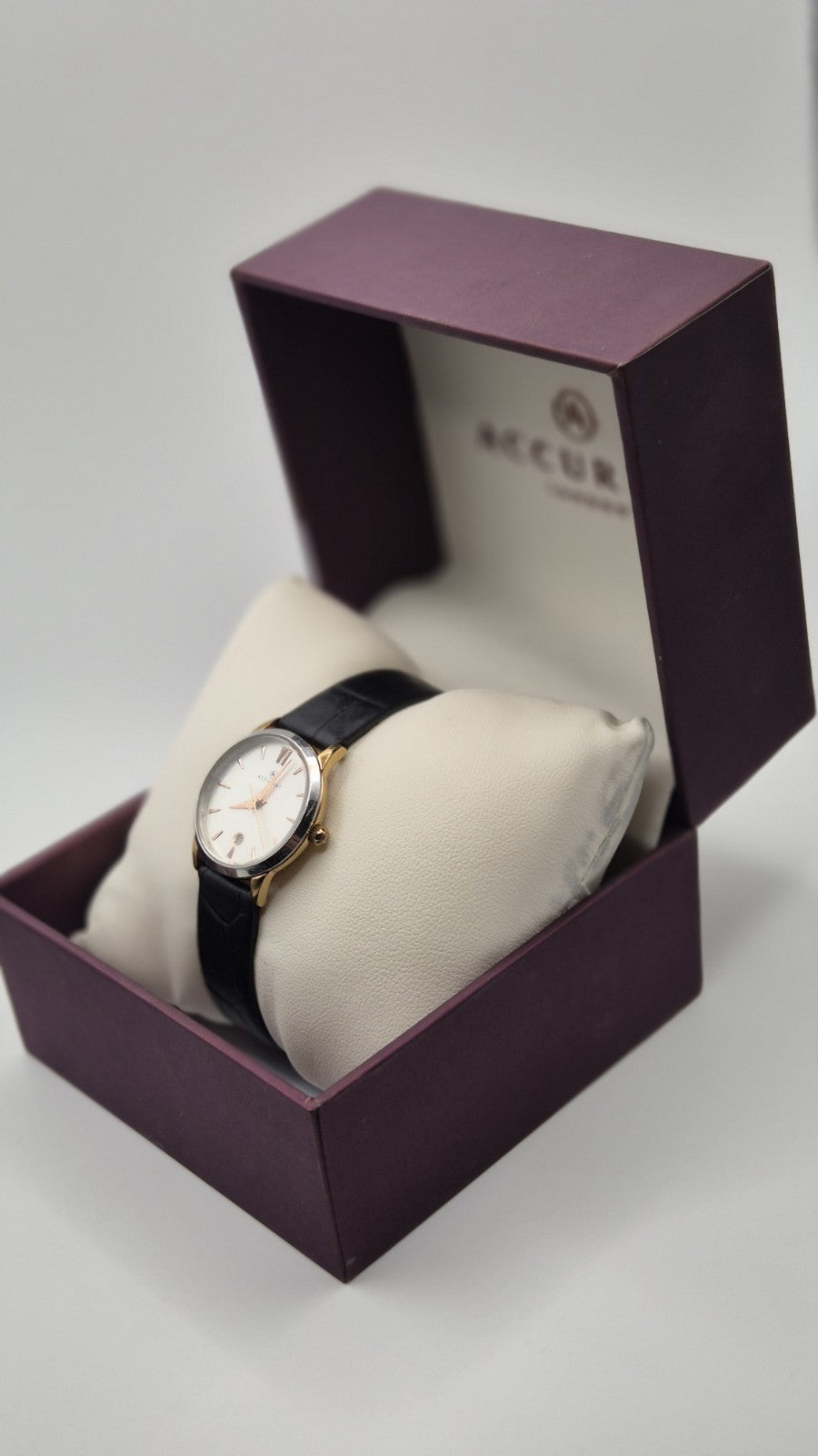 Accurist Ladies Classic Date wristwatch model 8073 with a white dial and...2