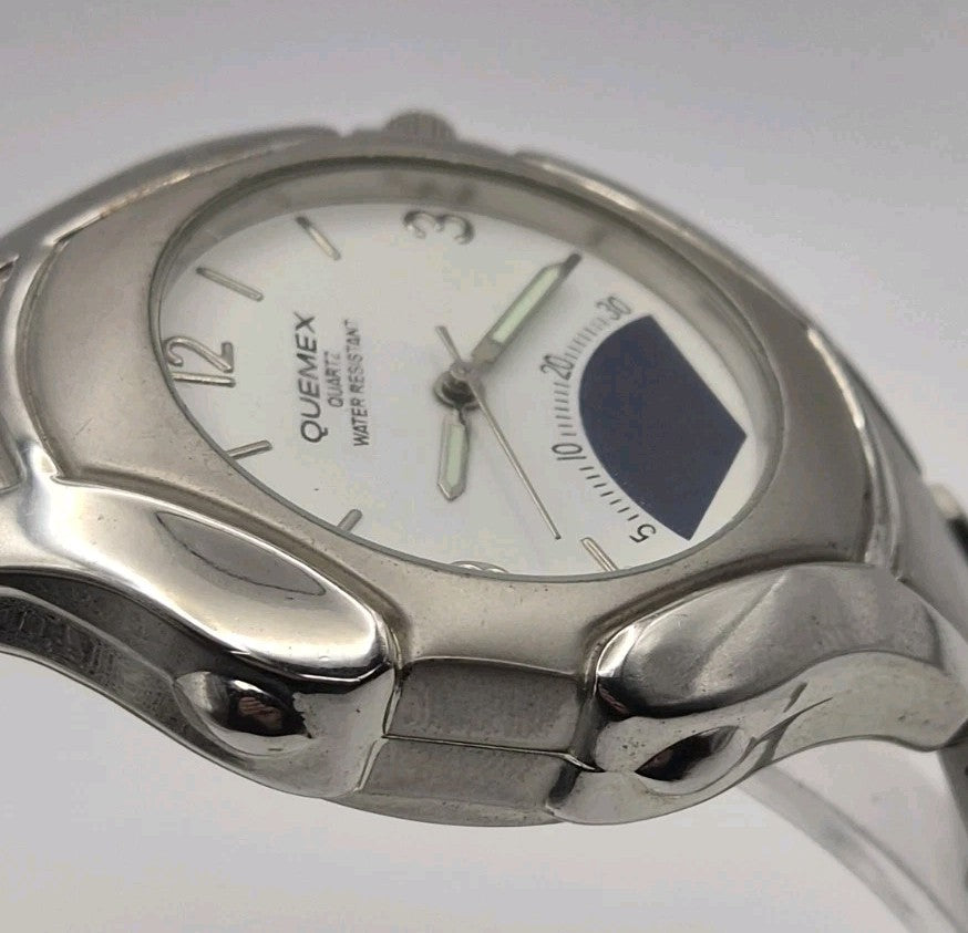 Mens Quemex quartz wristwatch with a silver-tone stainless steel case and...4