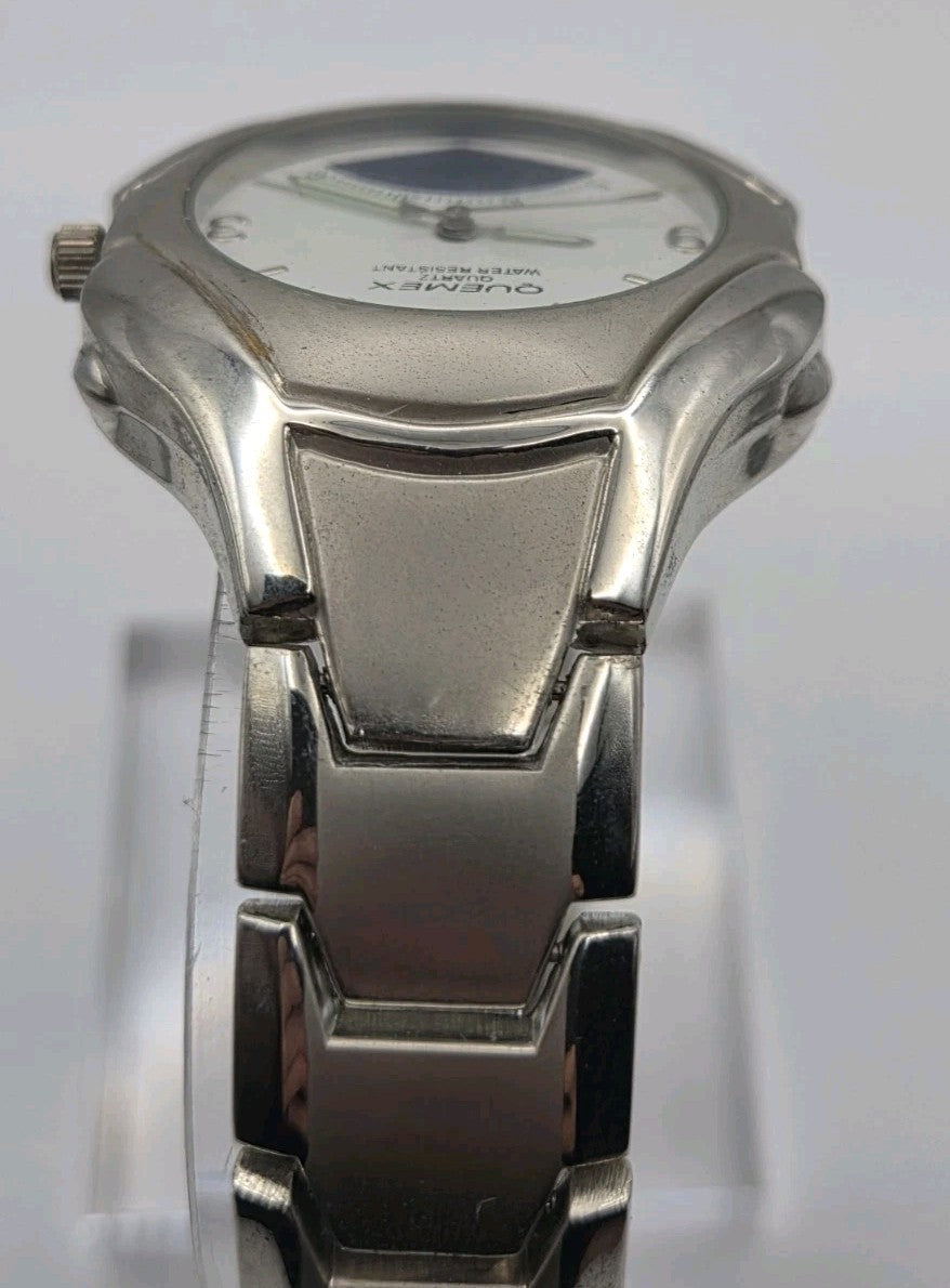 Mens Quemex quartz wristwatch with a silver-tone stainless steel case and...5