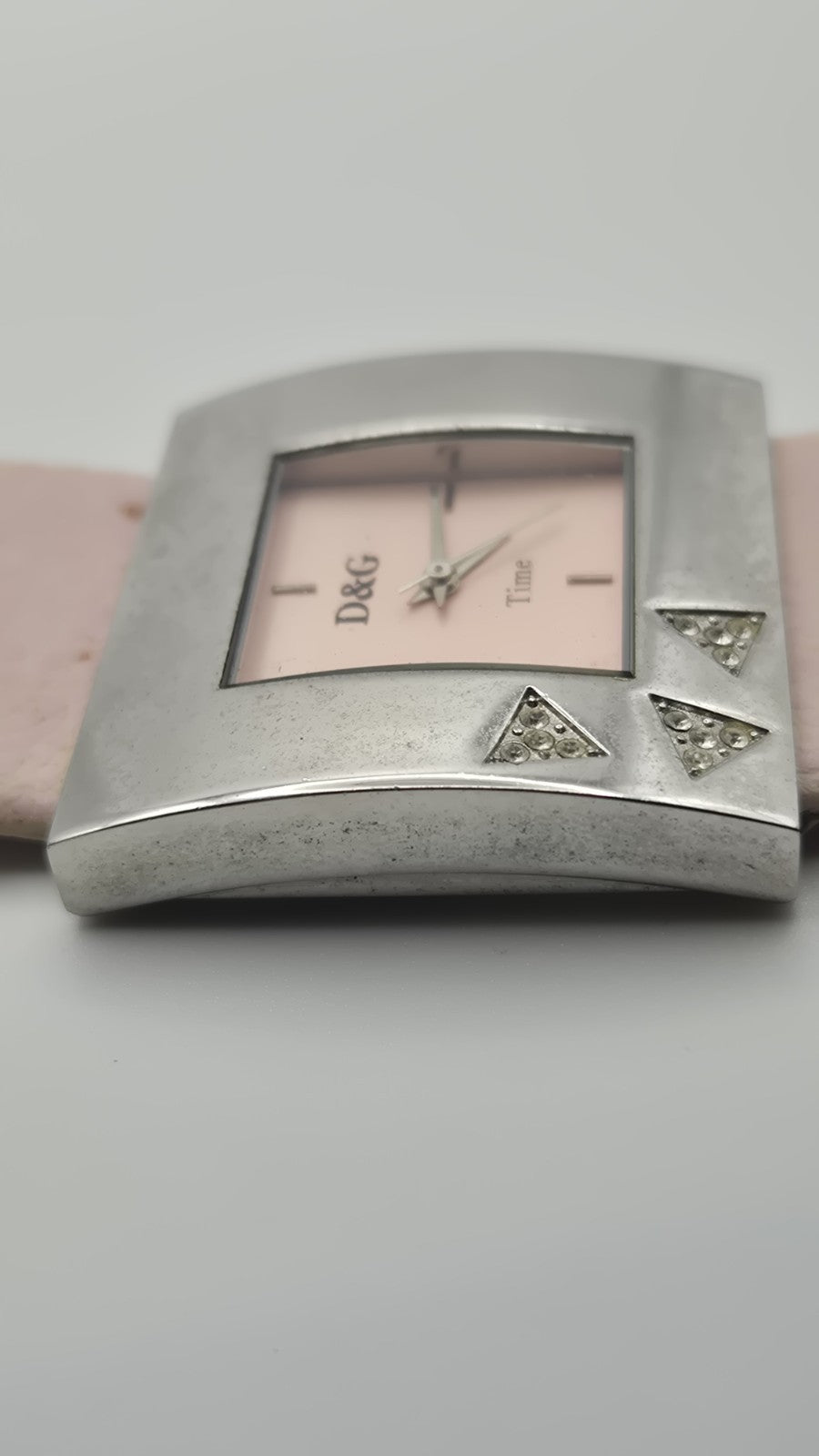 D&G Time squarefaced analog watch with a light pink leather strap and...5