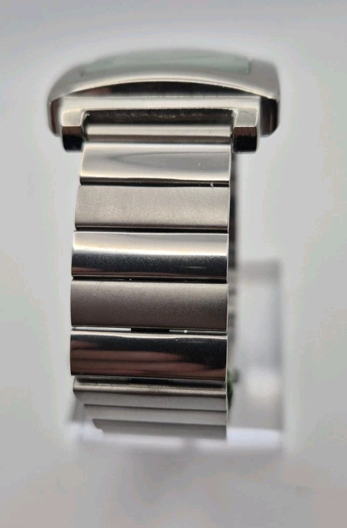 BNWT Quemex quartz Mens watch featuring a silver tone rectangular case and...4