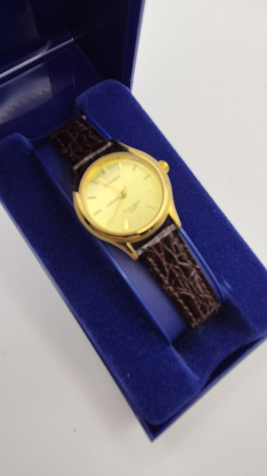 Sekonda Classic Quartz Watch with a gold-plated case and a brown, croc-effect...1